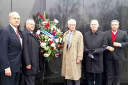 (From left to right): Bob Doubek, former executive director of the Vietnam Veterans Memorial Fund; Jan Scruggs, founder of the VVMF; Former Defense Sec. Chuck Hagel; Gen. Barry McCaffrey and Bob Knotts, president of VVMF. (WTOP/Kathy Stewart)