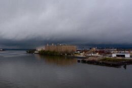 The band of intense of storms seen from South Capitol Street Douglass Bridge on Thursday afternoon. (WTOP/Dave Dildine)