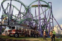 A stuck roller coaster at the Upper Marlboro, Maryland, Six Flags amusement park that had suspended 24 riders 80 feet in the air April 13, 2017 It took 50 fire fighters from Prince George's and Anne Arundel counties about four hours to rescue the riders. (Courtesy Mark Brady/Prince George's County Fire Department)