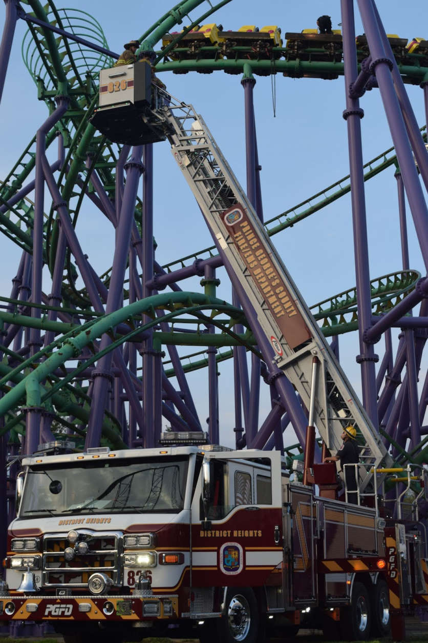 A stuck roller coaster at the Upper Marlboro, Maryland, Six Flags amusement park that had suspended 24 riders 80 feet in the air April 13, 2017 It took 50 fire fighters from Prince George's and Anne Arundel counties about four hours to rescue the riders. (Courtesy Mark Brady/Prince George's County Fire Department)