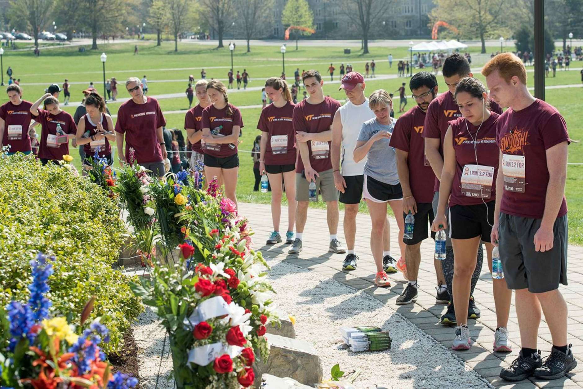 Participants in the 3.2-Mile Run in Remembrance visit the April 16 Memorial on Saturday, April 15, 2017. (Courtesy Virginia Tech)