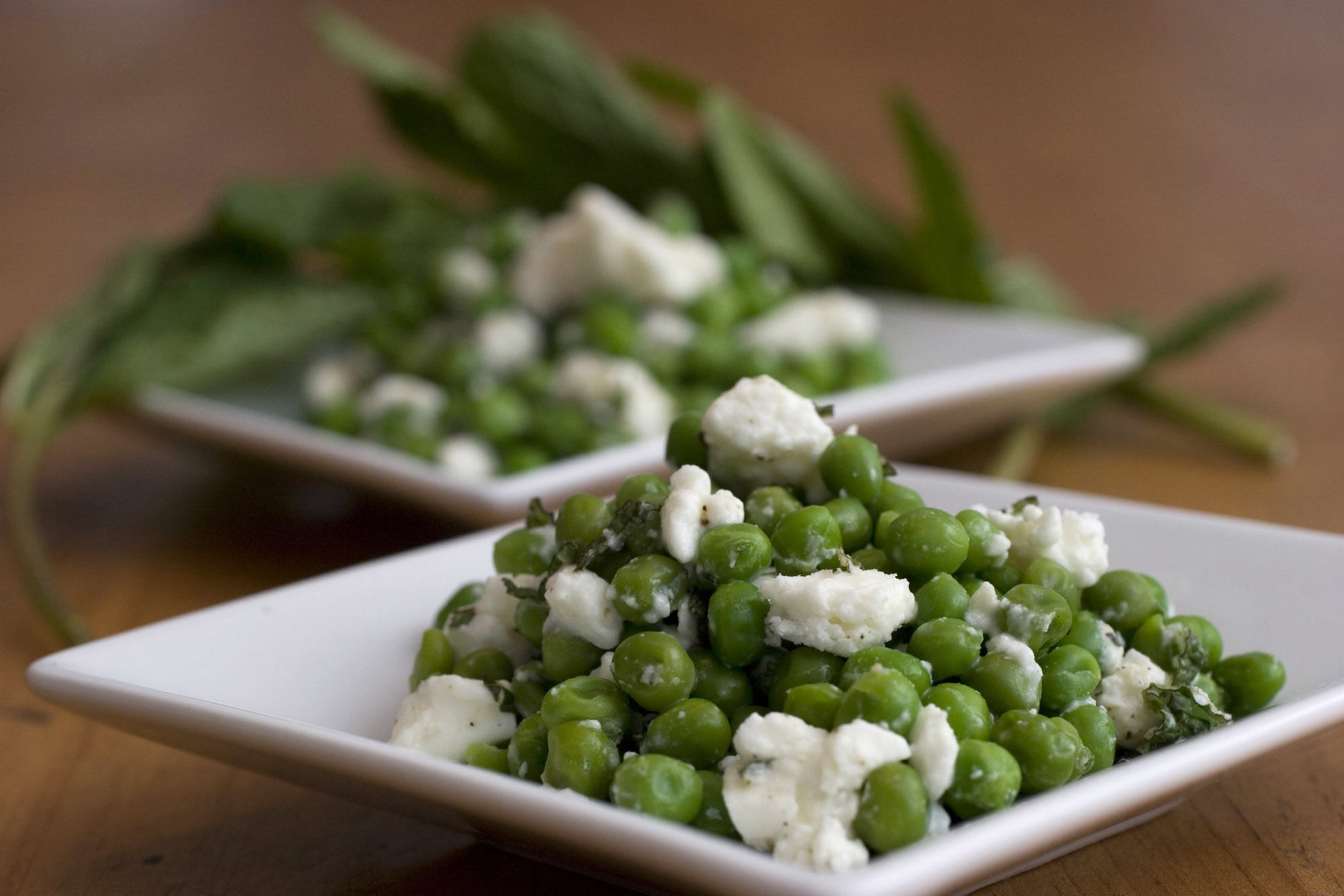 **FOR USE WITH AP LIFESTYLES**   A plate of Minted Peas with Feta Cheese is seen in this Sunday, March 2, 2008 photo. These Minted Peas with Feta Cheese are not only tasty but come packed with important vitamins and minerals. The recipe uses green peas which are actually legumes but a generally treated as vegetables.   (AP Photo/Larry Crowe)