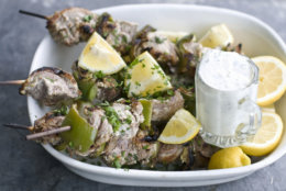 This image taken on May 30, 2012 shows a recipe for grilled herbed Greek lamb kebabs in Concord, N.H. (AP Photo/Matthew Mead)