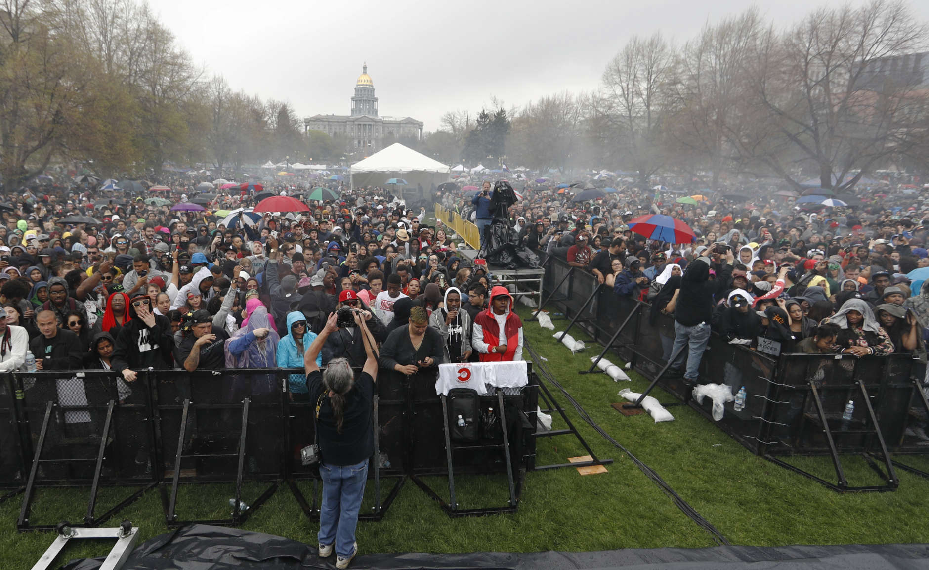 FILE -- Marijuana enthusiasts light up at 4:20 p.m. MDT to mark the 4/20 holiday on Thursday, April 20, 2017, in Denver's Civic Center Park. The annual celebration of cannabis culture attracted users from across the intermountain West to Denver. (AP Photo/David Zalubowski)