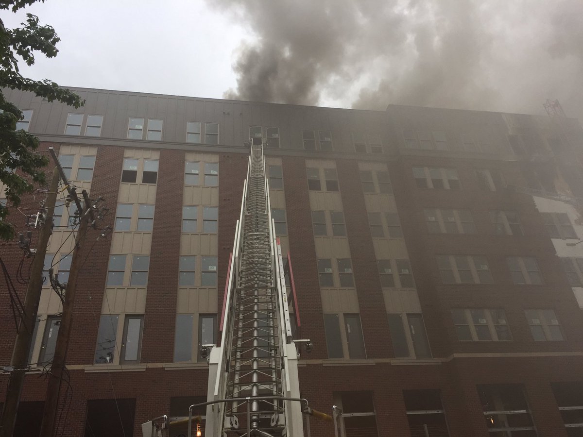 Officials said the fire appears to have begun on the fifth floor of the six-story building and spread to the roof. (Courtesy Mark Brady)