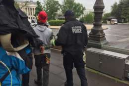 Capitol police arrest marijuana advocates who defiantly consumed during a "Reschedule 420" event Monday. (WTOP/Kristi King)