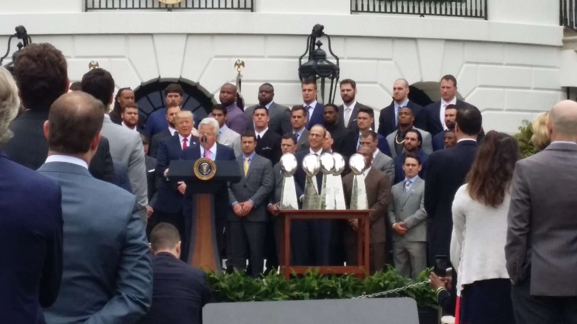 Patriots owner Robert Kraft speaks during a ceremony honoring the Super Bowl champion New England Patriots on the South Lawn. (WTOP/J. Brooks)