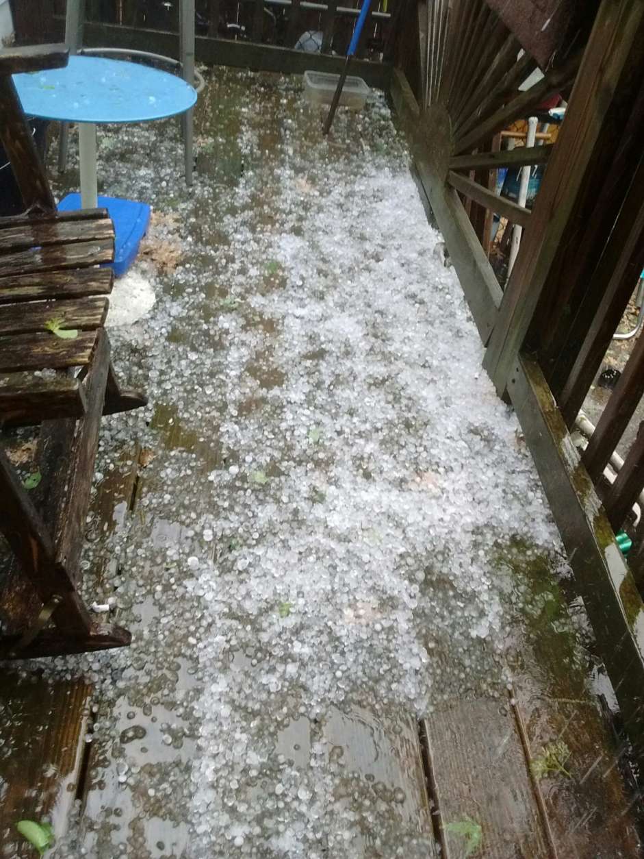 Photo of hail on a deck