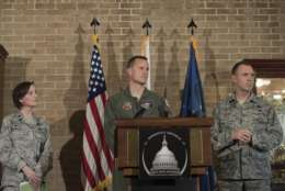 From left, Lt. Col. Lisa Mabbutt, Lt. Colonel Michael Croker and Brigadier General George Degnon of the D.C. Air National Guard, participate in a news conference at Andrews Air Force Base, Md., Wednesday, April 5, 2017, about the military aircraft crash in Clinton, Md.  A fighter pilot on a training mission ejected safely before the jet crashed in a wooded area in a Washington suburb. Witnesses reported the sound of live ammunition. (AP Photo/Sait Serkan Gurbuz)