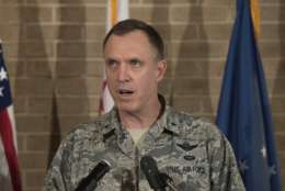 Brigadier General George Degnon, acting adjutant general of the D.C. Air National Guard, speaks at a news conference at Andrews Air Force Base, Md., Wednesday, April 5, 2017. about the military aircraft crash in Clinton, Md.  A fighter pilot on a training mission ejected safely before the jet crashed in a wooded area in a Washington suburb. Witnesses reported the sound of live ammunition. (AP Photo/Sait Serkan Gurbuz)