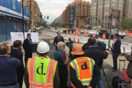 DDOT Director Leif Dormsjo and Sean Cahill, senior vice president of Property Group Partners, give an update on the Capitol Crossing/I-395 project at a Wednesday news conference.
 (WTOP/Kristi King)