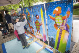 PAINTING: Mural painting allows youngsters to test their artistic talents on Maryland Day. (Courtesy, John T. Consoli/University of Maryland)