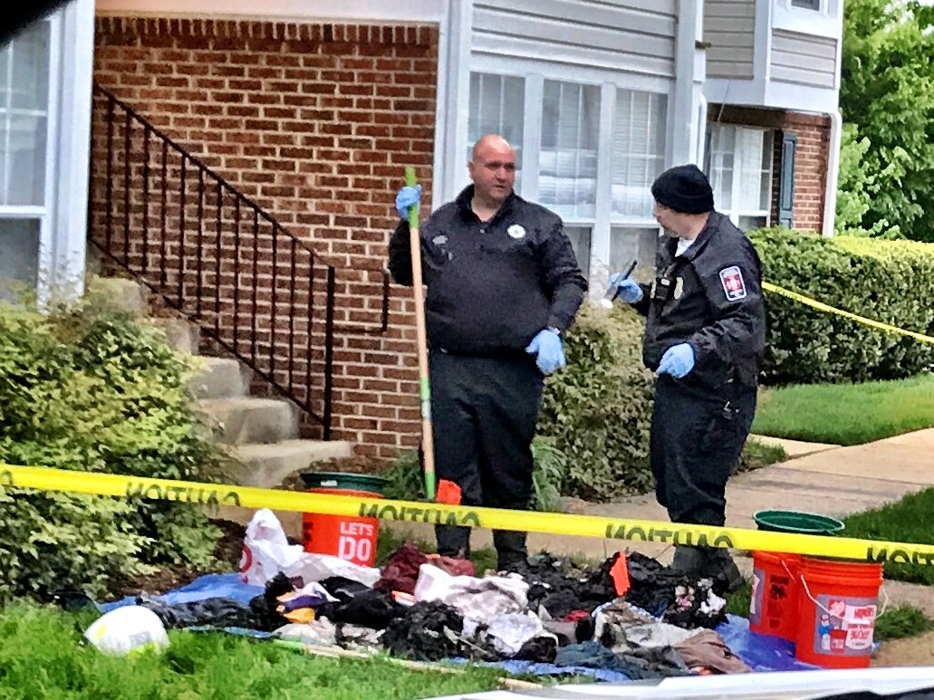 The fire was small, officials said, but crews found an unconscious man inside the apartment with the fire. (WTOP/Neal Augenstein)