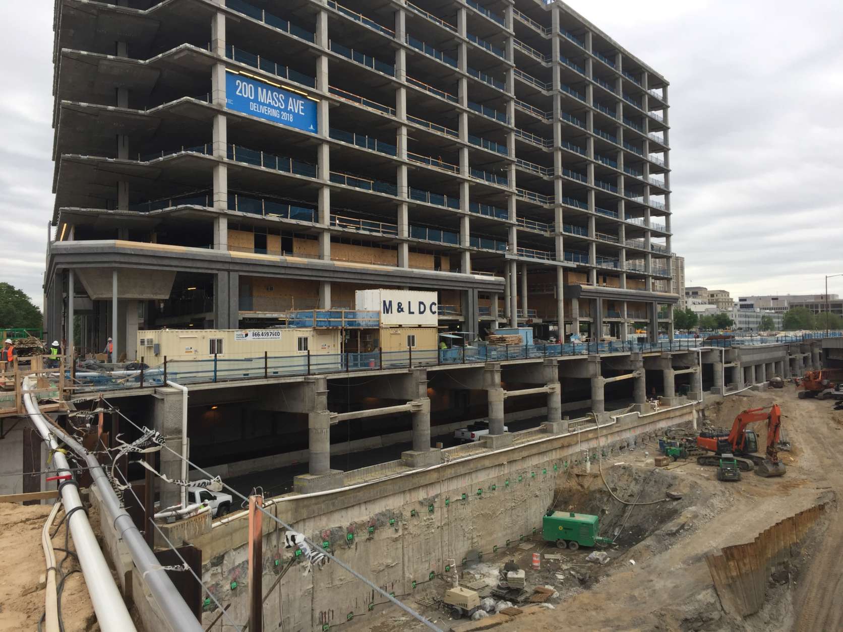 200 Massachusetts Avenue is scheduled to open in mid-2018, with commercial and retail space. The white truck pictured is parked on the soon to open access ramp from Massachusetts Avenue to I-395 southbound.  (WTOP/Kristi King)