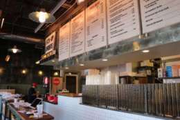 The restaurant’s menu includes a variety of sandwiches and ribs, along with a full assortment of specialty items and sides. There is a 30-person seating area inside, and takeout and catering orders will also be available. (Courtesy of RestonNow.com)