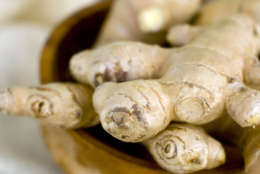 This Jan. 4, 2012 photo shows ginger root in Concord, N.H. Used quietly for years to add zip to everything from stir-fries to sushi, ginger also happens to be a key ingredient for the noodles and dumplings traditionally eaten for Chinese New Year, the two-week celebration of food and family that begins Jan. 23.    (AP Photo/Matthew Mead)