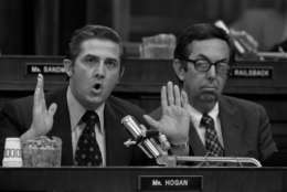 Rep. Lawrence Hogan, R-Md., left, presents his debate on the impeachment question before the House Judiciary Committee on July 25, 1974 in Washington D.C.  At right listening is Rep. Caldwell Butler, R-Va.  (AP Photo)
