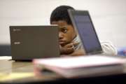 DC-area schools look to balance screens and traditional learning