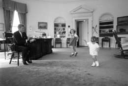 . Caroline and John Jr. at play in the Oval Office, Washington, DC, October, 10, 1962 © Cecil
Stoughton (Courtesy John F. Kennedy Presidential Library and Museum)
