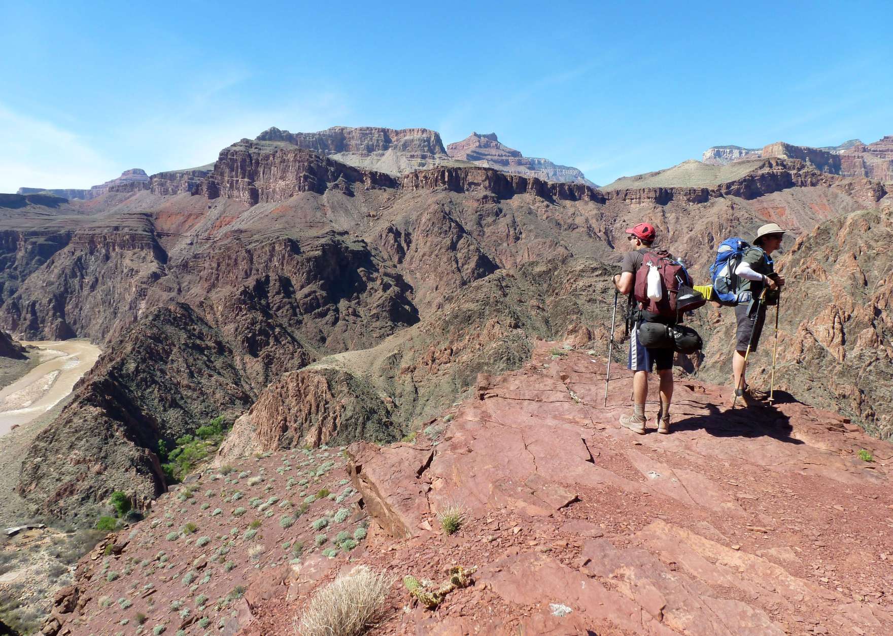Hikers stop to look at the views near the Grand Canyon National Parks South Kaibab trail on March 16, 2015. Many hikers choose to take the South Kaibab trail to the bottom of the canyon and then stay overnight at either Bright Angel Campground or Phantom Ranch before hiking back out. (AP Photo/Anna Johnson)