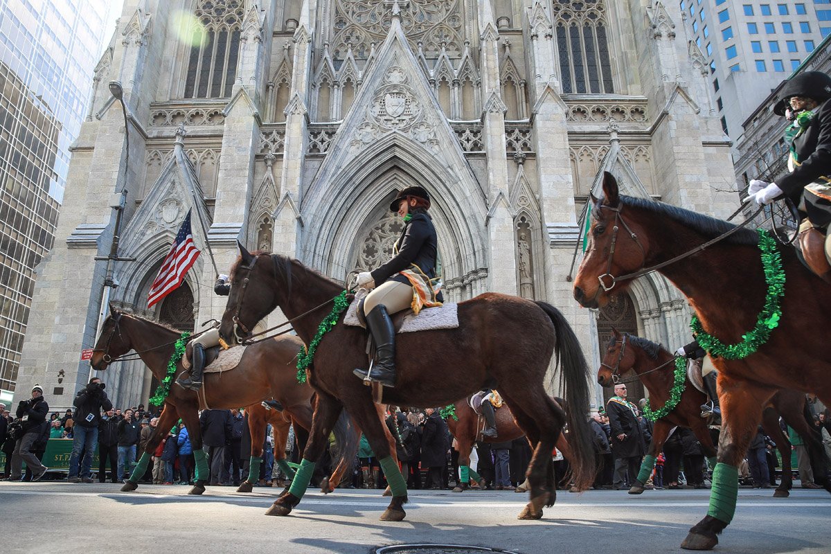 NEW YORK, NY - MARCH 17: Members of the County Carlow Association ride horses as they march past St. Patrick's Cathedral on 5th Avenue during the annual St. Patrick's Day parade, March 17, 2017 in New York City. The New York City St. Patrick's Day parade, dating back to 1762, is the world's largest St. Patrick's Day celebration. (Photo by Drew Angerer/Getty Images)