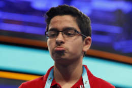 Varad Mulay, 13, from Novi, Mich., reacts after spelling his word during the finals of the 90th Scripps National Spelling Bee, Thursday, June 1, 2017, in Oxon Hill, Md. (AP Photo/Alex Brandon)