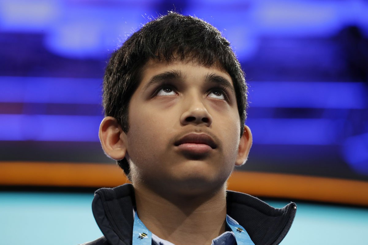Nikhil Lahiri, 14, of Painted Post, N.Y., thinks about how to spell his word during the 90th Scripps National Spelling Bee in Oxon Hill, Md., Thursday, June 1, 2017. (AP Photo/Jacquelyn Martin)