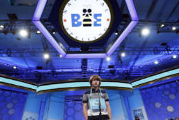 Sam Stephens, 14, from Stevensville, Mich., correctly spells his word in the third round of the 90th Scripps National Spelling Bee, Wednesday, May 31, 2017, in Oxon Hill, Md. (AP Photo/Alex Brandon)
