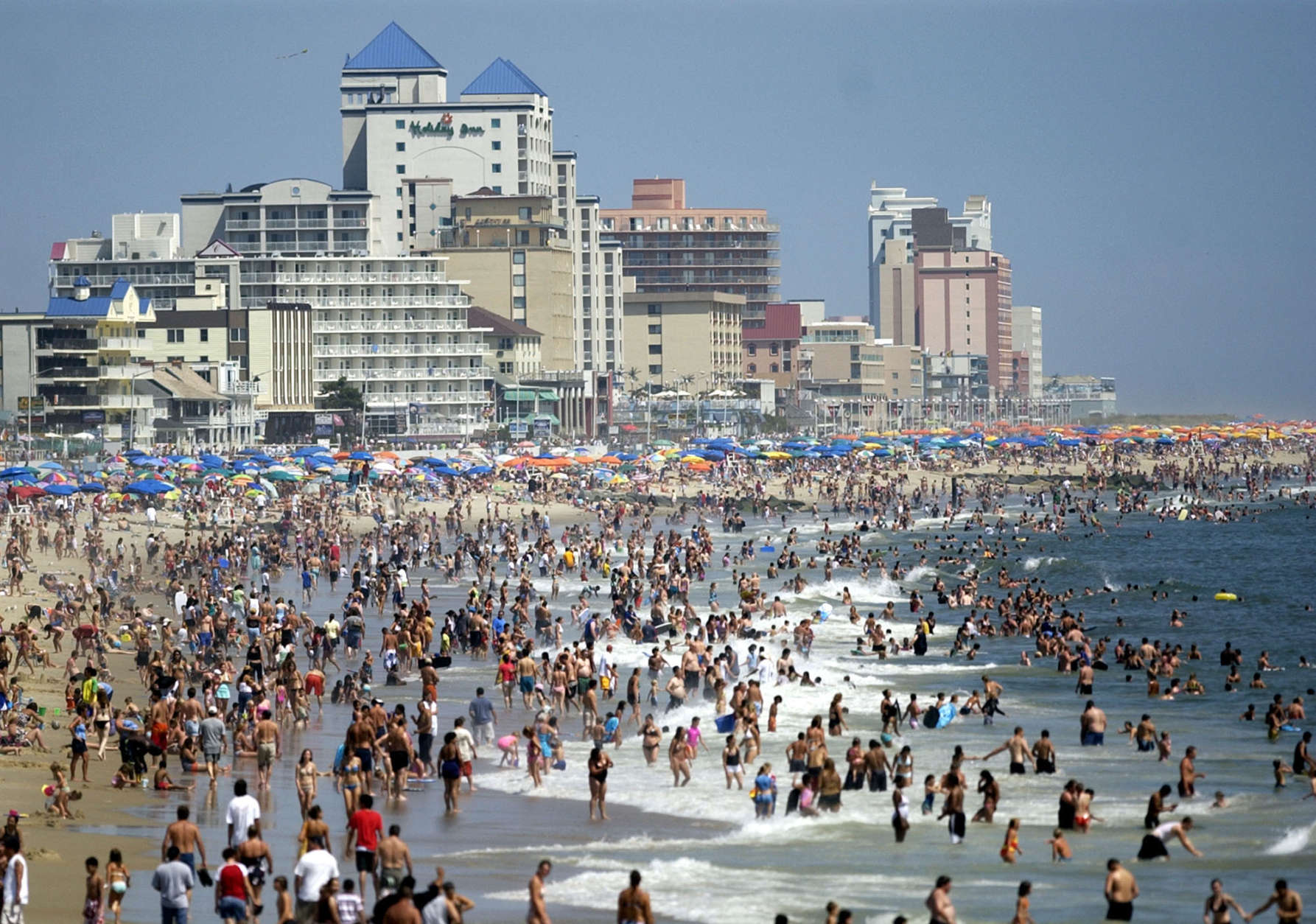 Sandwiched between the Atlantic Ocean and the Isle of Wright Bay, and just north of Assateague State Park, is Ocean City Maryland, home to 7,089 residents. However, the small resort town is anything but sleepy. (AP Photo/Matthew S. Gunby)