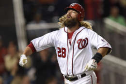 Washington Nationals' Jayson Werth celebrates his home run during the ninth inning of the team's baseball game against the Baltimore Orioles, Wednesday, May 10, 2017, in Washington. The Nationals won 7-6. (AP Photo/Nick Wass)