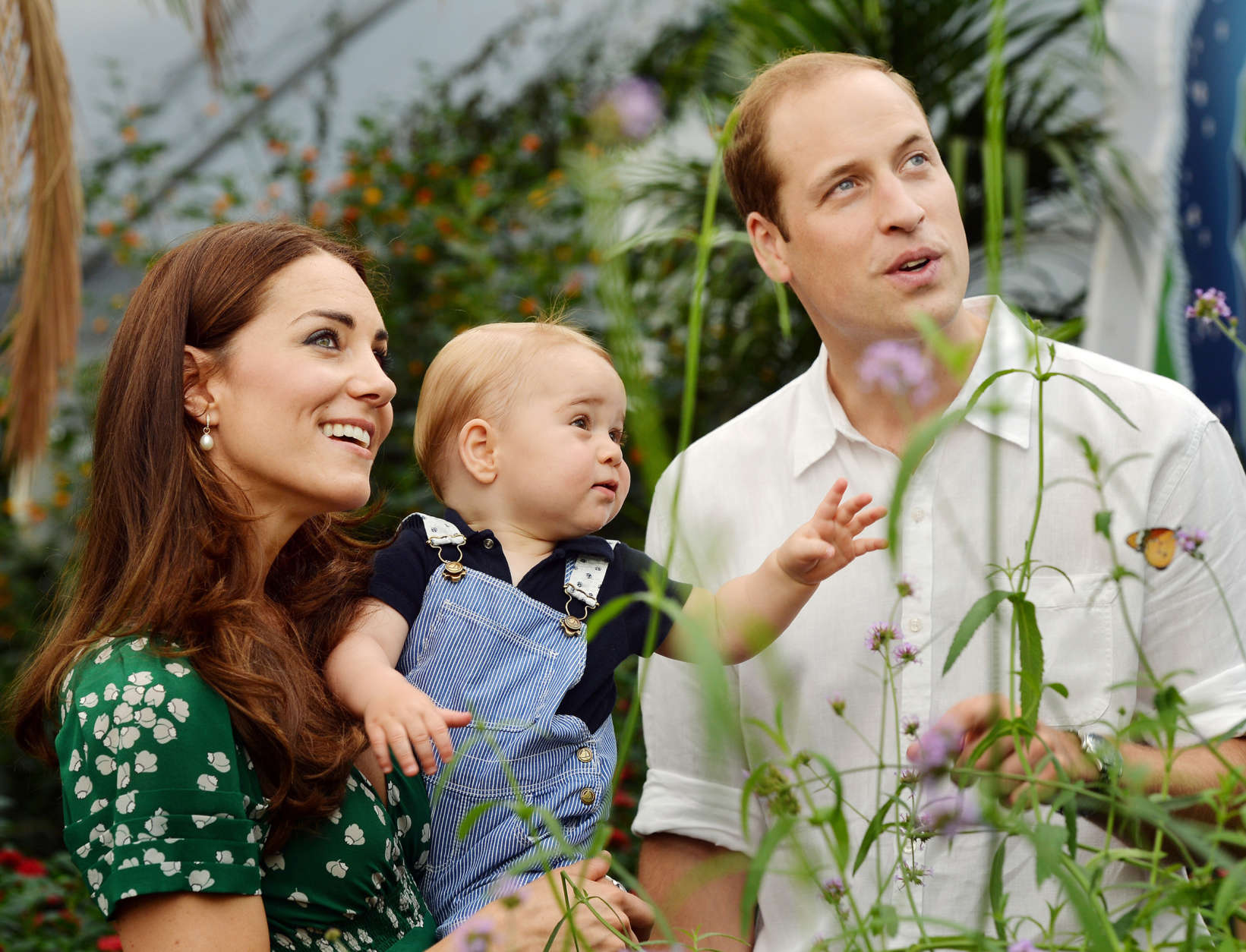 This July 2, 2014, file photo shows Britain's Prince William and Kate Duchess of Cambridge and Prince George during a visit to the Sensational Butterflies exhibition at the Natural History Museum, London.  (AP Photo/John Stillwell, File)