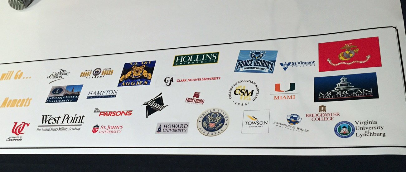 Logos from the 40+ schools and military branches that Oxon Hill grads will be attending. (WTOP/Rich Johnson)