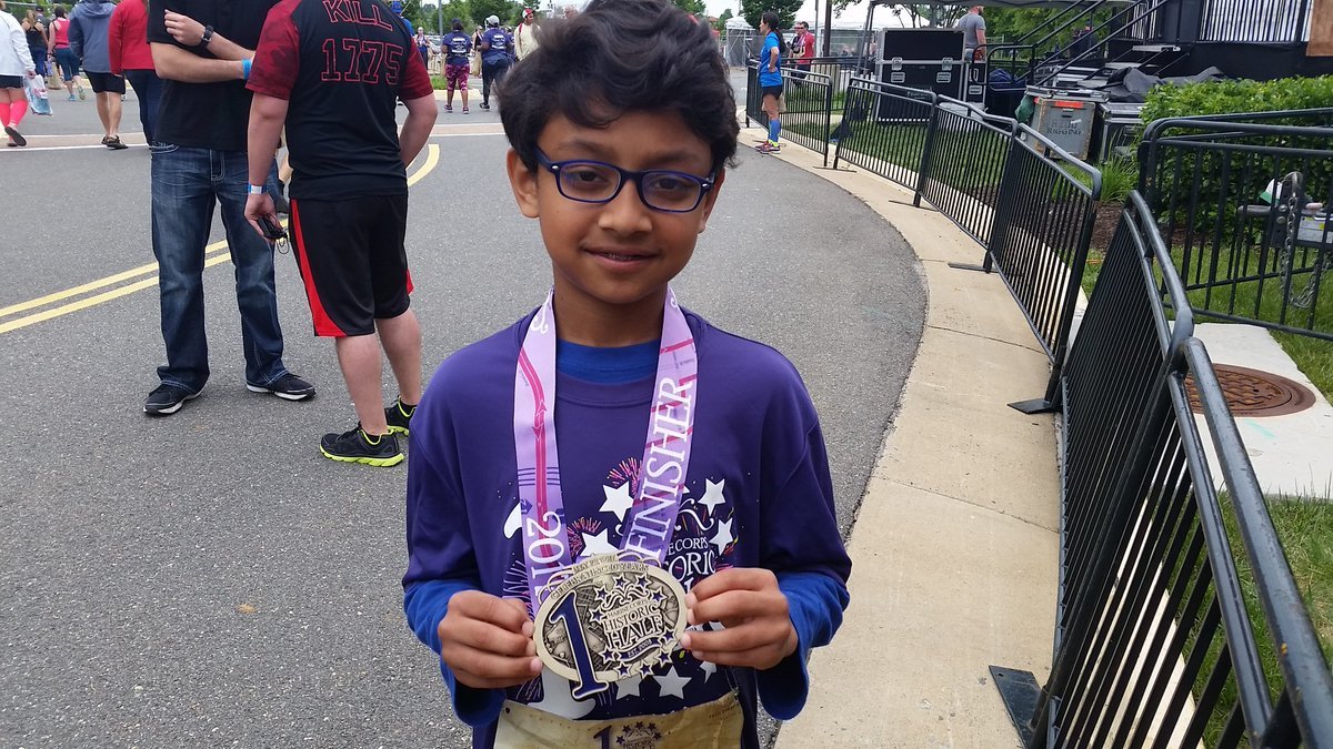 The youngest runner in this year's Historic Half is 9-year-old Yug Kolla from Ashburn. He's completed 3 half-marathons in 3 months. (WTOP/Kathy Stewart)