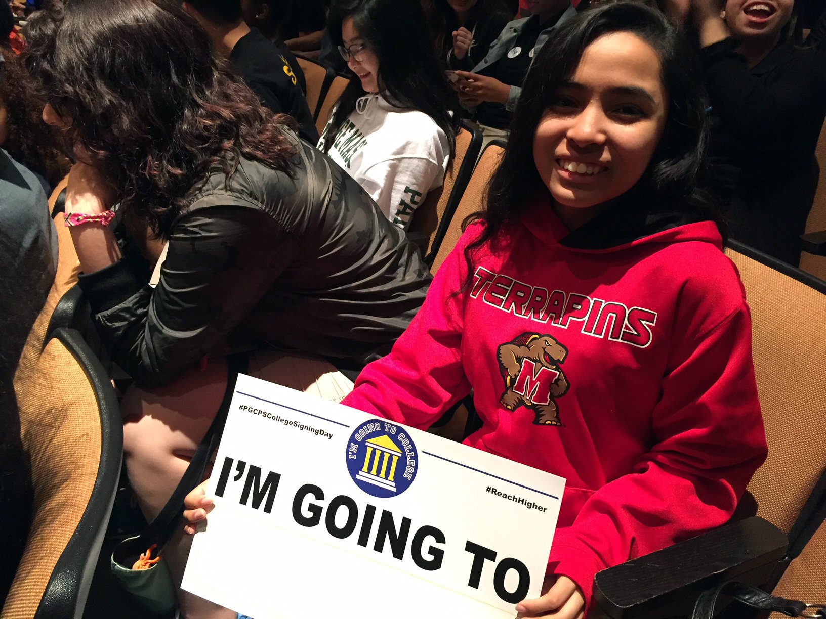 A senior getting ready to fill in the name of the college she'll be attending. (WTOP/Rich Johnson)