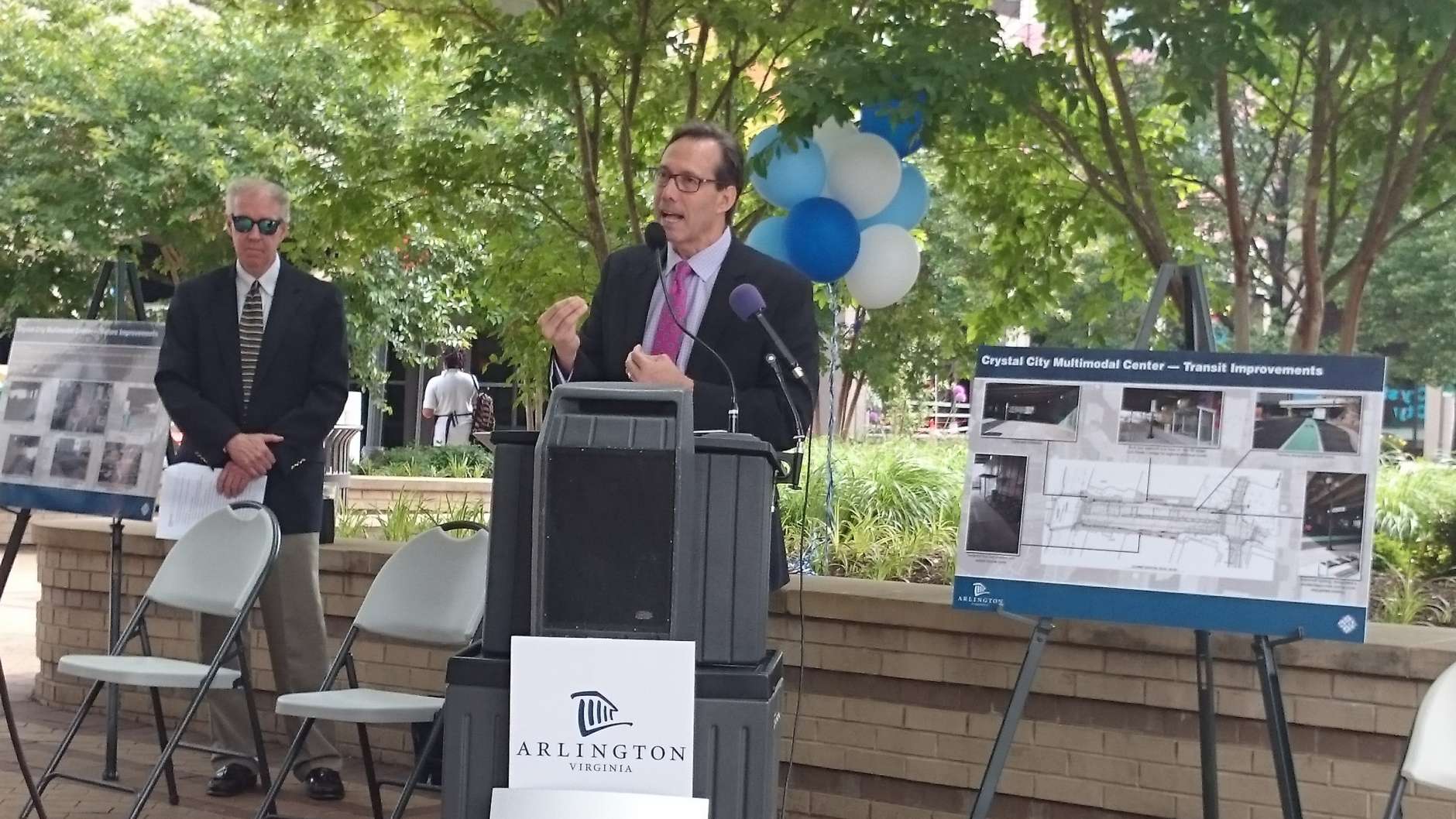 Arlington County Board chairman Jay Fisette speaking at the new Crystal City Multimodal Center. (WTOP/Dennis Foley)