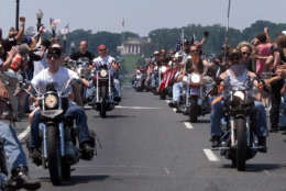 Some of an estimated 250,000 bikers descend upon Washington to take part in the 12th Annual "Rolling Thunder" memorial honoring POW's and MIA's Sunday, May 30, 1999.  In the background is Arlington National Cemetery. (AP Photo/Khue Bui)