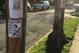 Racist flyers hung on poles in the Del Ray neighborhood of Alexandria carried various racist messages aimed at African-Americans and immigrant groups and called for fascism to replace democracy in the United States. Portions of these images were altered due to privacy concerns and to meet WTOP editorial standards. (WTOP/Dick Uliano) 