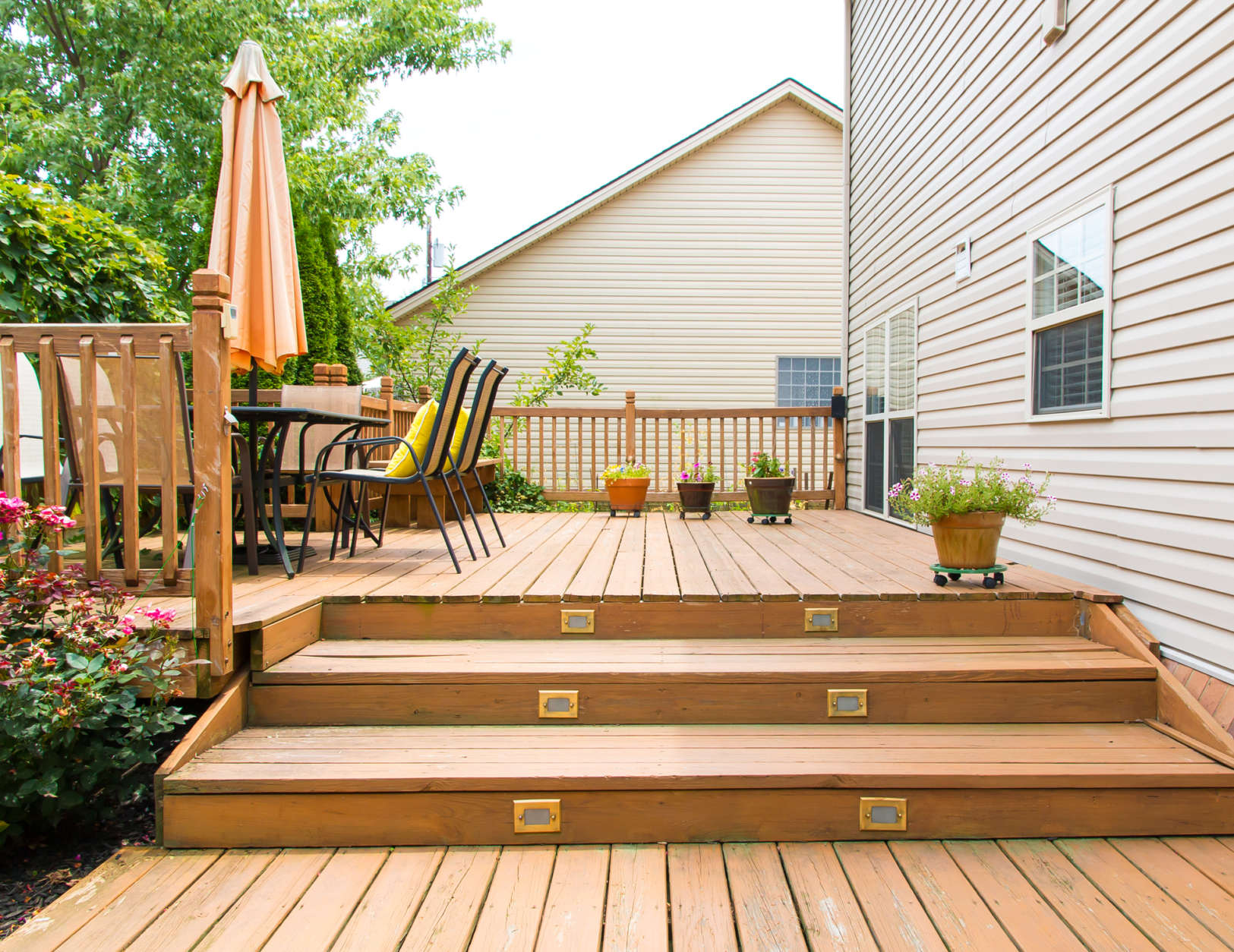 Carpenter bees attacking your wooden deck or porch? Mike McGrath suggests homeowners try building the bees an alternative habitat, almond oil can also help. But applying a paint or wood stain will be the only long-term solution to stop those pollinators in their tracks. (Thinkstock)