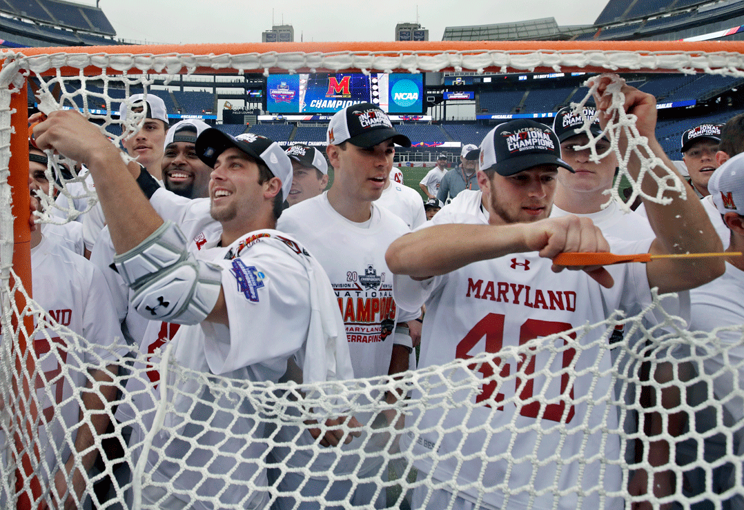 Maryland players cut down the net to celebrate after their victory over Ohio State in the NCAA college Division 1 lacrosse championship final, Monday, May 29, 2017, in Foxborough, Mass. (AP Photo/Elise Amendola)