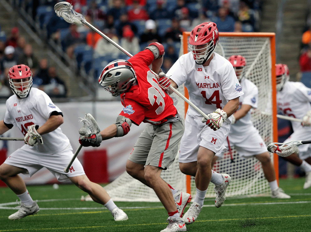 Maryland's Tim Muller (14) defends against Ohio State's Johnny Pearson (30) during the first half of the NCAA college Division 1 lacrosse championship final, Monday, May 29, 2017, in Foxborough, Mass. Muller was named Most Outstanding Player of the tournament. (AP Photo/Elise Amendola)