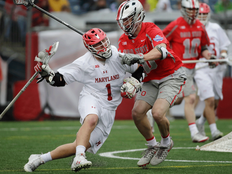 Maryland's Matt Rambo (1) moves with the ball against Ohio State's Ben Randall (40) during the second half of the NCAA college Division 1 lacrosse championship final, Monday, May 29, 2017, in Foxborough, Mass. (AP Photo/Elise Amendola)