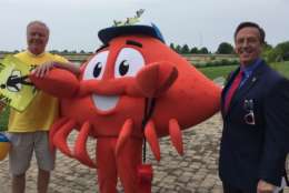 Ocean City Mayor Rick Meehan and Maryland Deputy Secretary of Transportation, Jim Ports pose with Cheswick, the Lifeguard Crab, who counsels pedestrians and bicyclists to https://oceancitymd.gov/oc/walksmart/ "Save Yourself!"