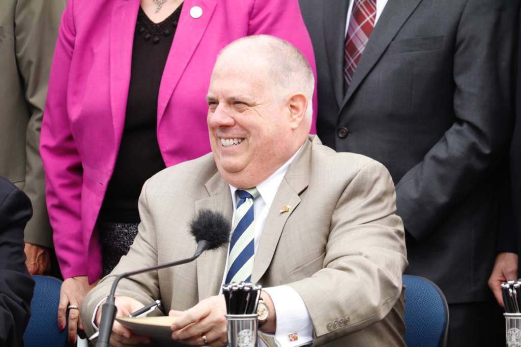 Gov. Larry Hogan signed over 200 bills Thursday at the state capital’s City Dock, and the occasion was marked with bipartisan moments. (WTOP/Kate Ryan)