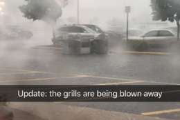 Grills for sale at a Fairfax County, Virginia, Lowes were blowing across parking lot in Thursday evening's storm. (WTOP/Kyle Cooper)