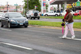The high pedestrian accident toll has led to few safety improvements on dangerous stretches of University Boulevard like this one in Langley Park. Yet when students were killed close to the University of Maryland campus nearby, the state lowered the speed limit, added a pedestrian signal, installed a median fence and increased use of speed cameras. (Capital News Service/Rebecca Rainey)