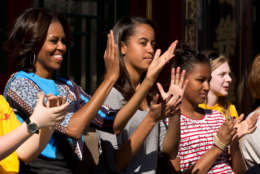 Former first lady Michelle Obama with daughters Malia and Sasha (AP)