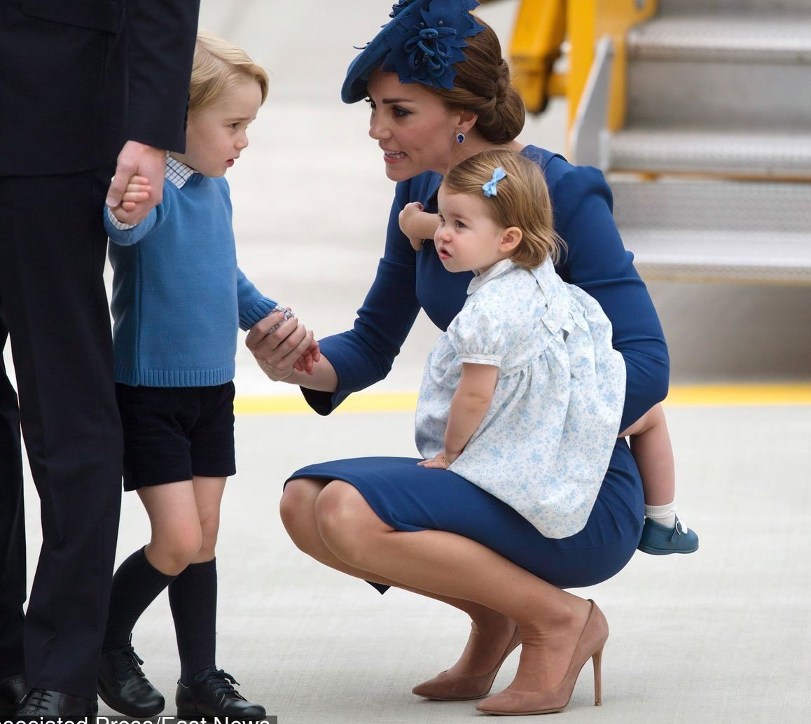 Kate Middleton, Duchess of Cambridge, and her son, Prince George and daughter Princess Charlotte.  (Getty)