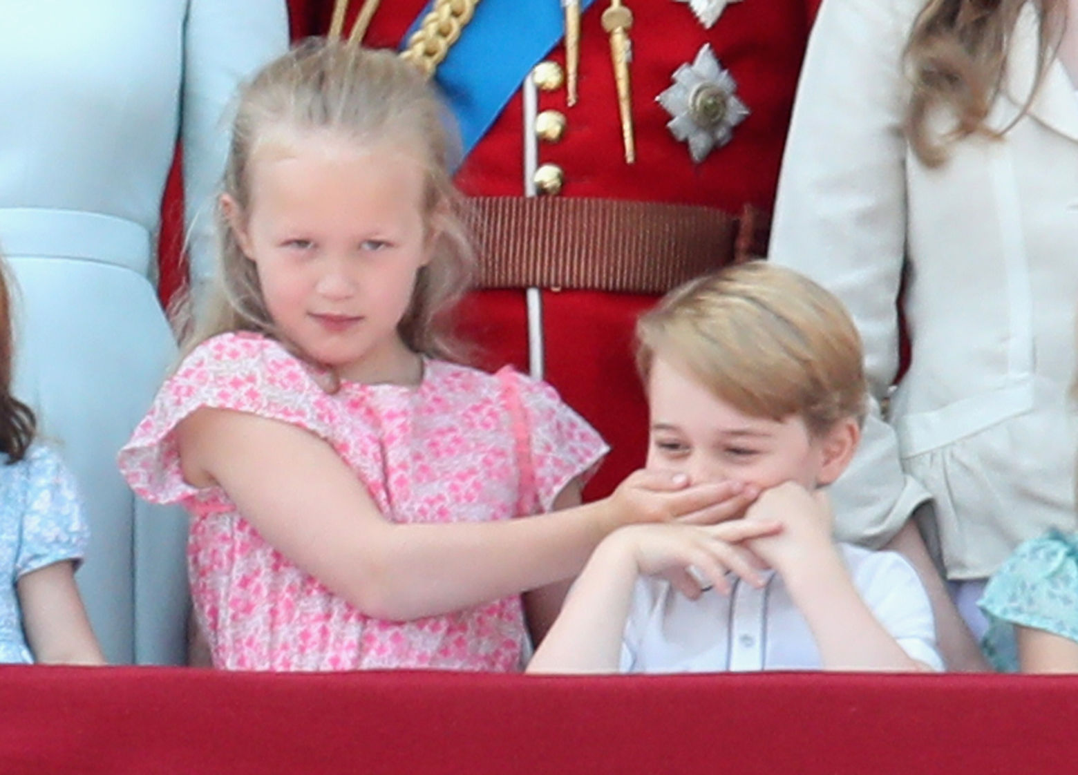 Savannah Phillips and Prince George of Cambridge watch the flypast on the balcony of Buckingham Palace during Trooping The Colour on June 9, 2018 in London, England. 
