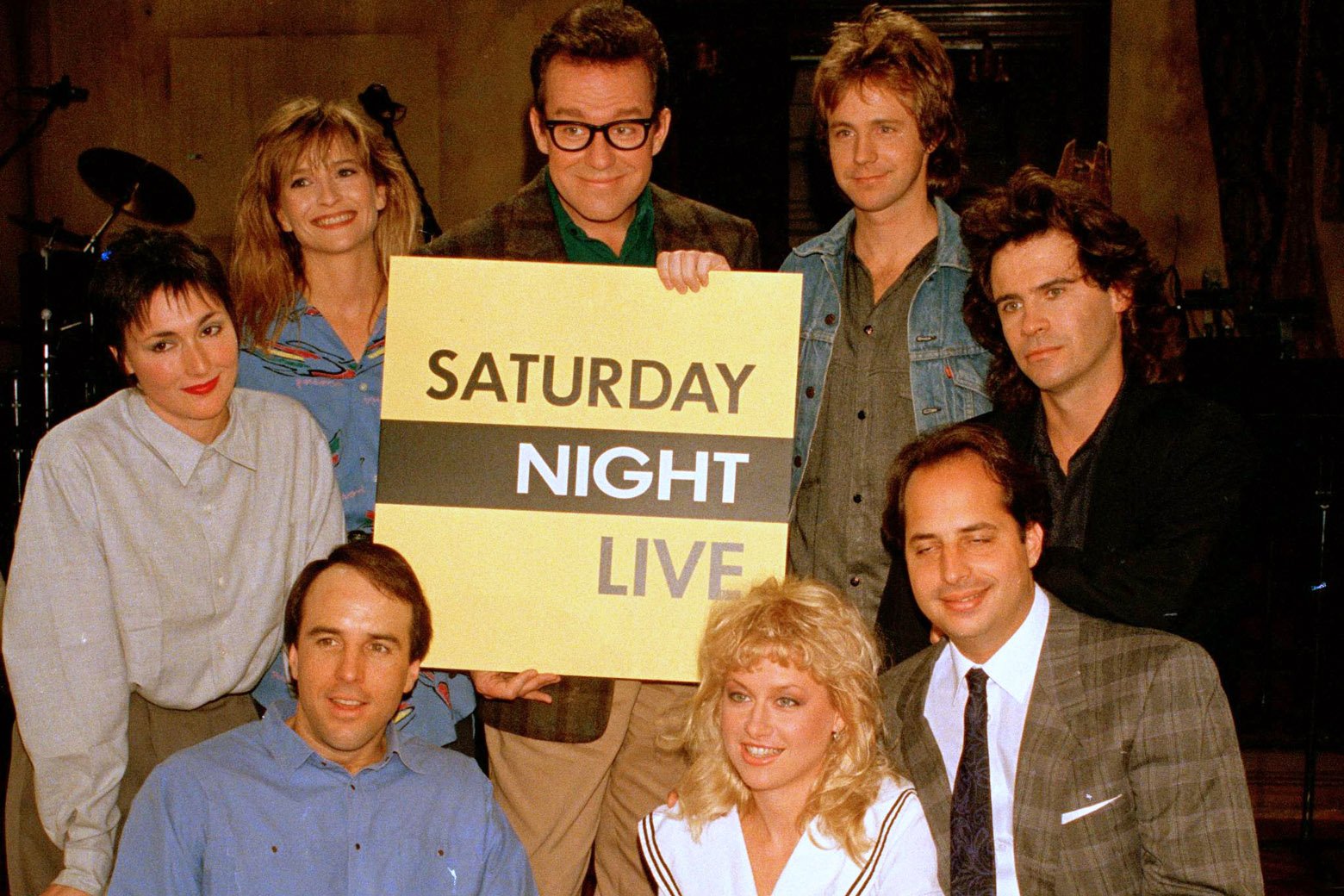 The cast of NBC's "Saturday Night Live," clockwise, from left:  Nora Dunn, Jan Hooks, Phil Hartman, Dana Carvey, Dennis Miller, Jon Lovitz, Victoria Jackson, and Kevin Nealon, pose together, Dec. 9, 1986.  (AP Photo/Richard Drew)