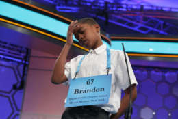 Brandon Anderson of Mount Vernon, New York, reacts after he misspelled his word during round two of 2017 Scripps National Spelling Bee at Gaylord National Resort & Convention Center May 31, 2017 in National Harbor, Maryland. Close to 300 spellers are competing in the annual spelling contest for the top honor this year. (Photo by Alex Wong/Getty Images)